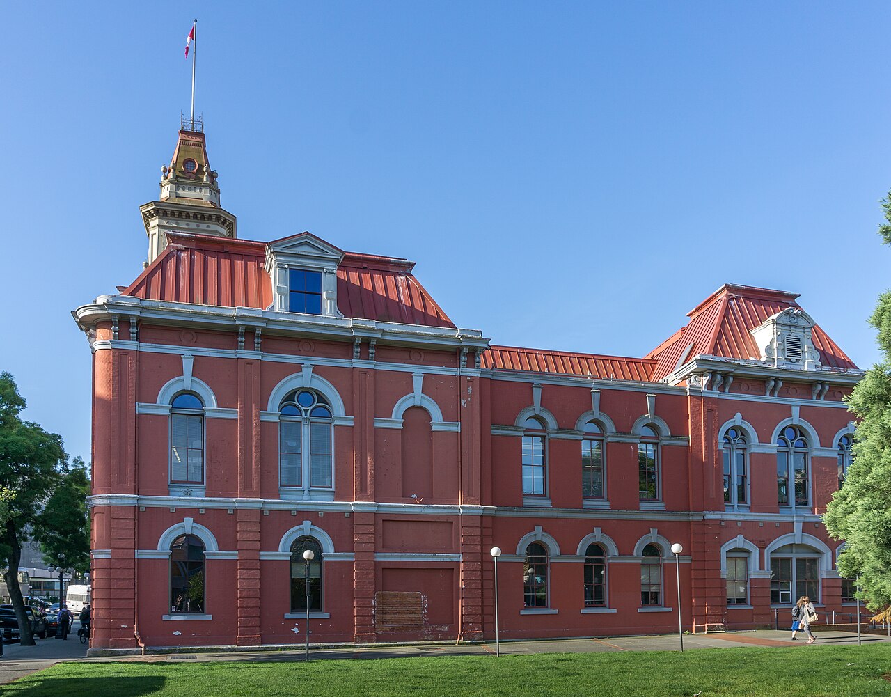 The red brick Victoria City Hall building and its clock tower